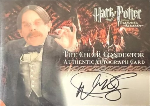 Warwick Davis as The Choir Conductor - Front