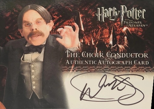 Warwick Davis as The Choir Conductor - Front