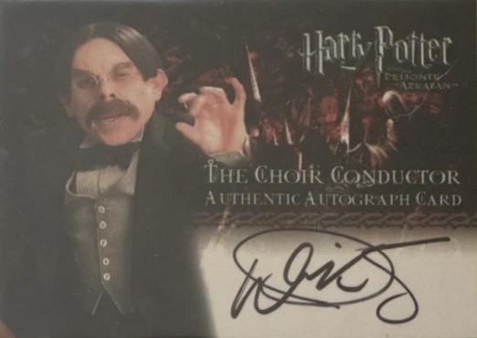 Warwick Davis as The Choir Conductor - Front